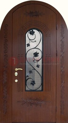 Качественная входная арочная дверь со стеклом и ковкой ДА-18 в Гатчине