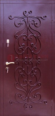 Бордовая металлическая дверь с ковкой ДК-21 в кирпичный дом в Гатчине
