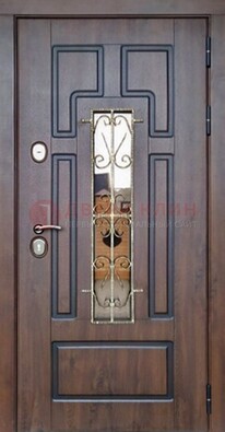 Уличная дверь со стеклом и ковкой для дома ДСК-177 в Гатчине