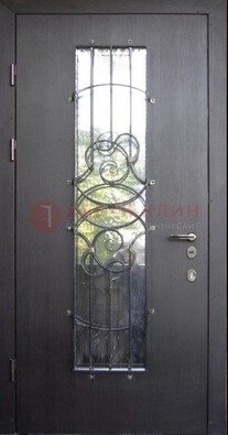 Остекленная стальная дверь с ковкой ДСК-26 в Гатчине