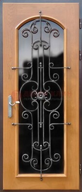 Морозостойкая дверь со стеклом темного цвета и ковкой ДСК-63 в Гатчине