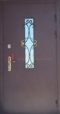 Металлическая дверь со стеклом и ковкой ДСК-77 в панельный дом в Люберцах