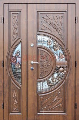 Уличная дверь в цвете Итальянский орех с виноритом и ковкой со стеклом ДВТ-147 в Домодедово