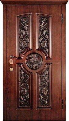 Филенчатая металлическая дверь с виноритом и резьбой ДВТ-69 в Гатчине